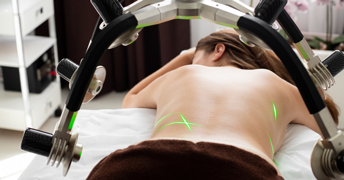 Manual scar tissue mobilization therapy on abdominal area after liposuction